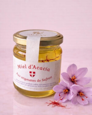 Vue sur un pot de miel d'acacia aux stigmates de Safran du Genevois